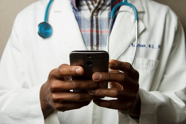 Healthcare worker using phone